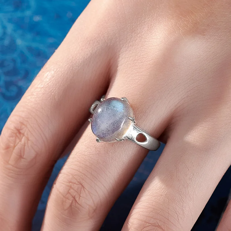 S925 فضة سحر الدائري للنساء الرجال الجوف نمط مخلب مطعمة البيضاوي Moonstone الأزياء والمجوهرات بالجملة