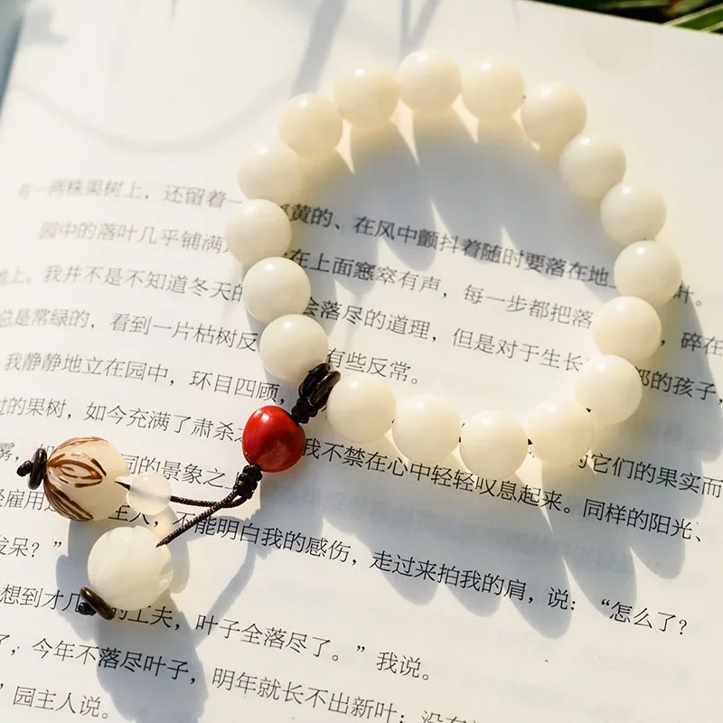 

Retro single ring Buddha bodhi son hand string small lotus pendant women simple gift white jade bodhi root bracelet gift men hot