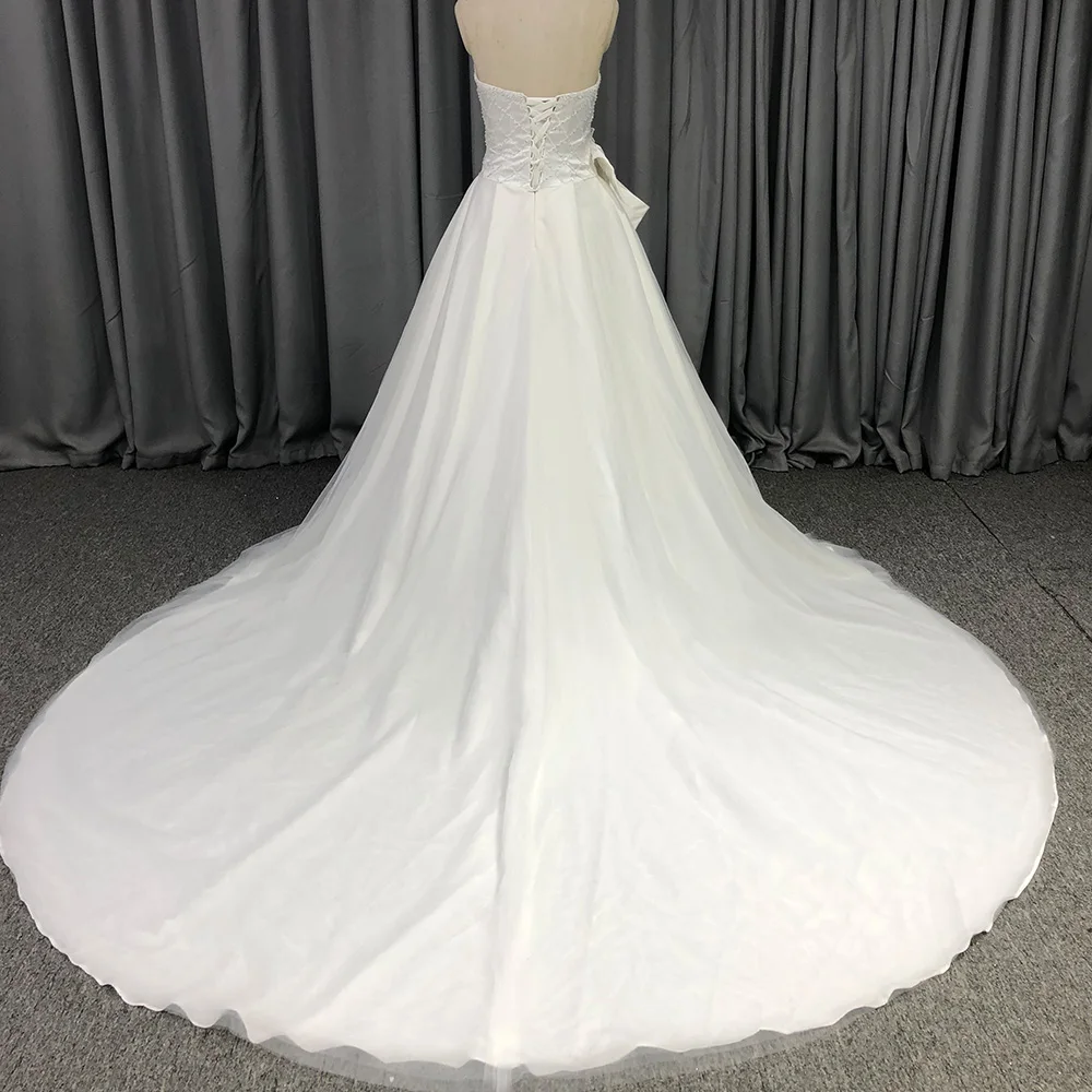 Bohemian Strapless A-line Exquisite Wedding Dresses Charming Lace Peals Bride Gowns Sleeveless Backless Sexy Robe de Mariée