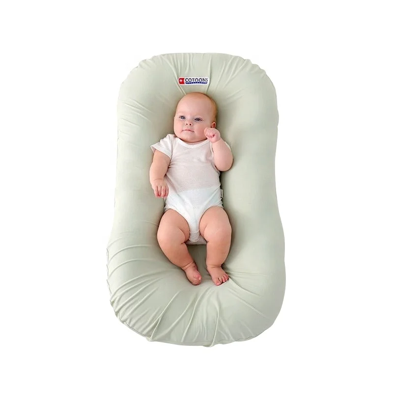 Lit bionique en polyester pour nouveau-né, douillet et confortable pour bébé, vente en gros, printemps automne