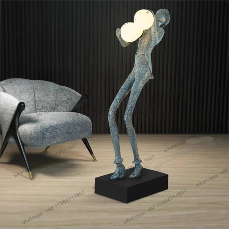 Abstract figure holding ball Sales office Hotel living room Humanoid statue Art ornament Decoration floor
