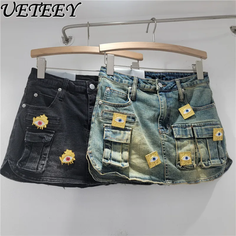 

Женская джинсовая юбка 2026: Новинка лета, винтажный стиль, металлическая фурнитура, рабочая одежда, большие карманы, завышенная талия, стройнящая, А-силуэт, короткая юбка