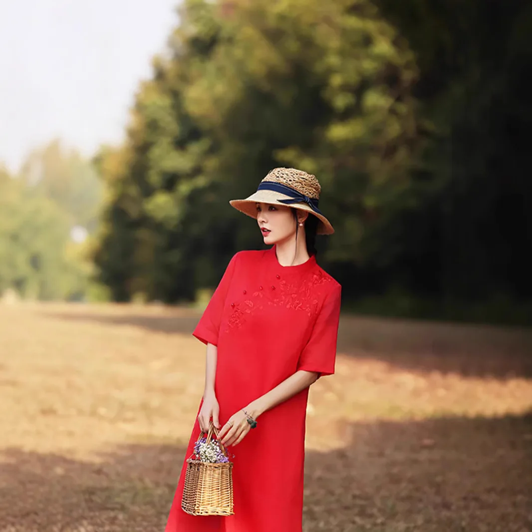 

Ramie dress five-quarter sleeve stand-up collar buckle improved embroidery embroidery cheongsam medium and long dress fashion ca