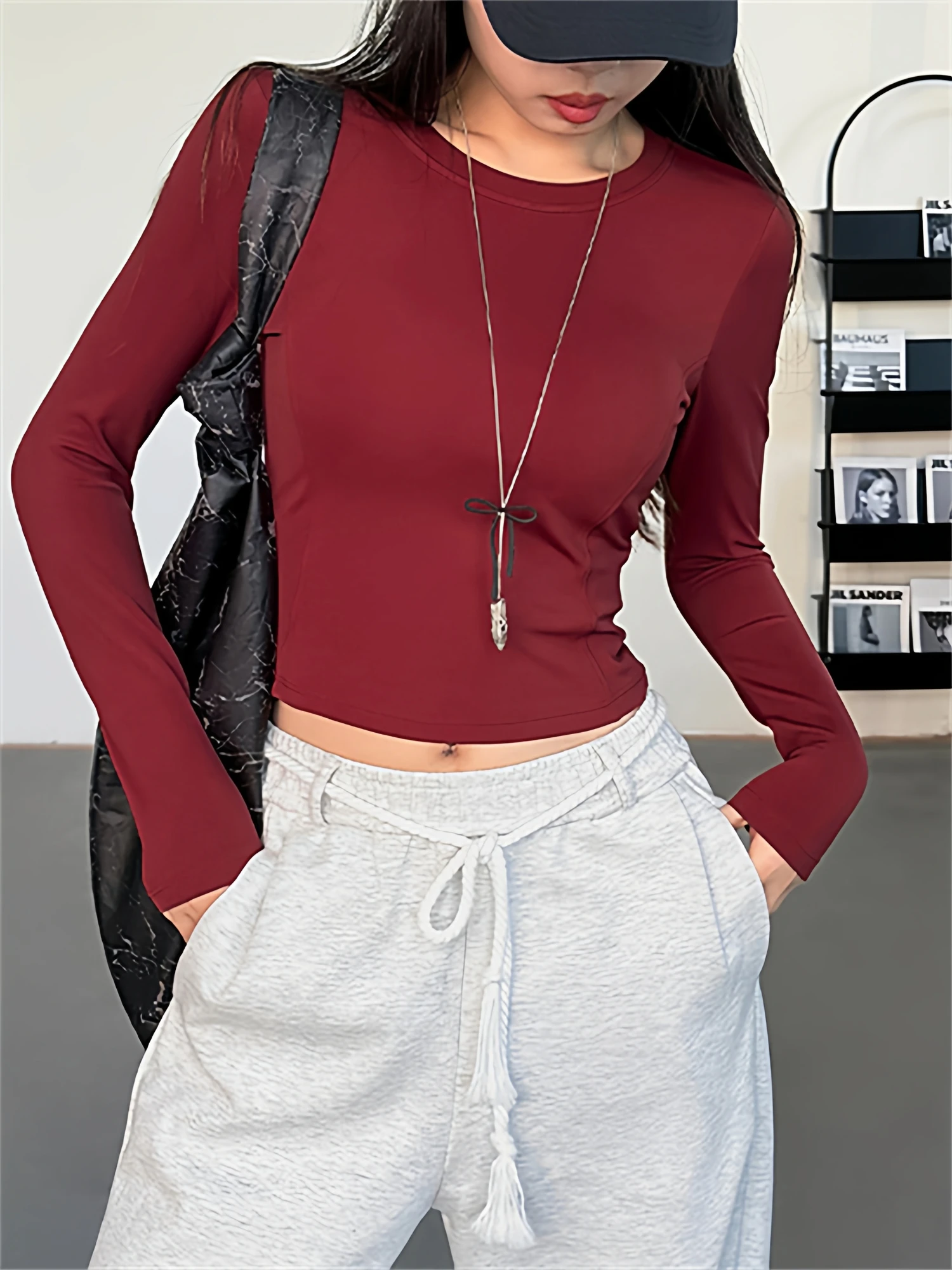 

Women's Yoga Top Long Sve Fitn Sportswear Hollow out Ba Tight T-irt Breathable Chest Pad Autumn Winter New Arrival