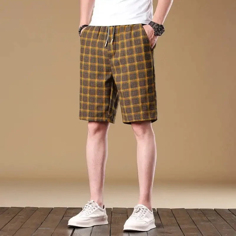 Casual summer plaid shorts with drawstring for men, simple loose and versatile American retro style trousers for men.