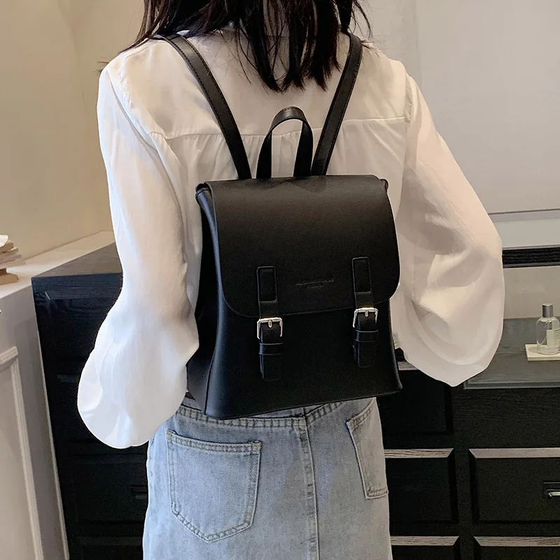 Mochila pequeña de estilo europeo para mujer, bolso escolar informal con textura de cuero PU que combina con todo, tendencia 2023