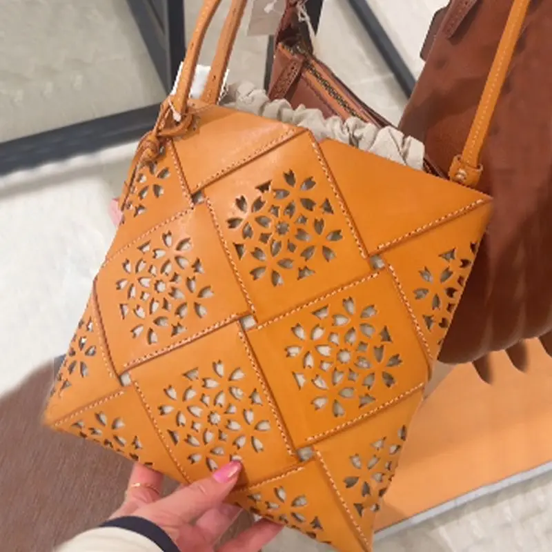 

Brown Hollow Window Grilles Tote Bag Women's 2026 New Light Luxury Pack Niche High-value Shoulder Package Summer Messenger Bags