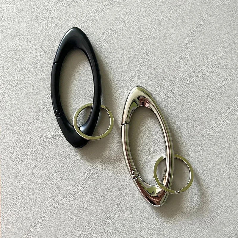 แฟชั่นโลหะ Carabiner มัลติฟังก์ชั่พวงกุญแจจี้สําหรับผู้หญิงผู้ชายรูปไข่ Mountaineering เข็มขัดหัวเข็มขัดแหวนตกแต่งกระเป๋า