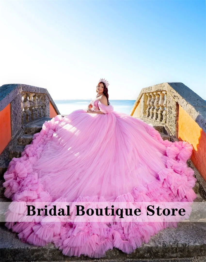 

Baby Pink Glitter Princess Quinceanera Dresses 2025 Luxury Puffy Train Beads Crystals Fairy Mexican Prom Custom Sweet 16 Dress
