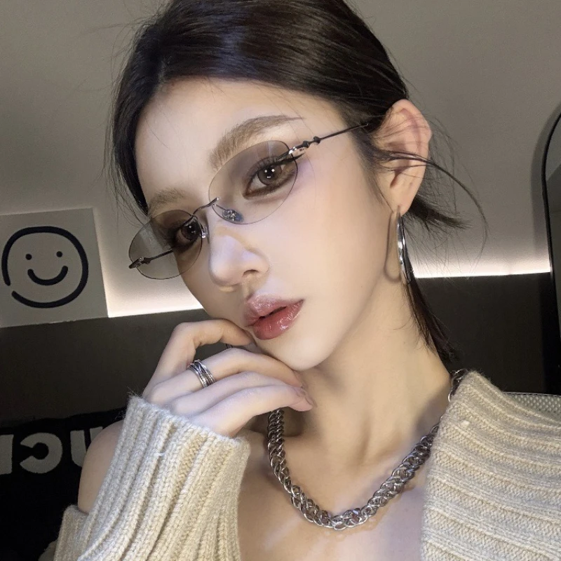 

Unisex Fashion Frameless Oval Sunglasses Ultra-Lightweight Stylish Eyewear Outdoor Travel Vacation Sun Protection Glasses