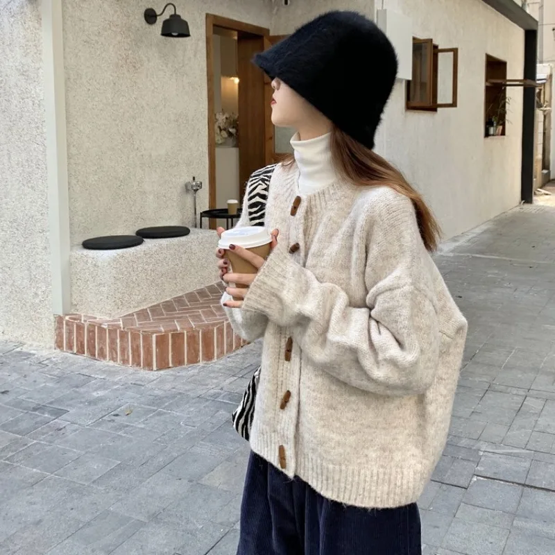 

Retro solid color ox horn button sweater coat female autumn and winter new lazy loose soft round knitted cardigan outer wear