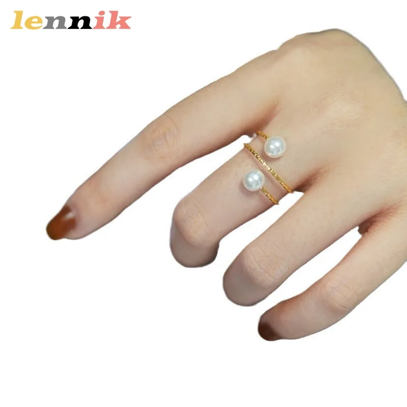 LENNIK Multi Layer Line Pearl Ring, Female Niche Design, Fashionable and High-end Sense, Movable Titanium Steel Gold Ring