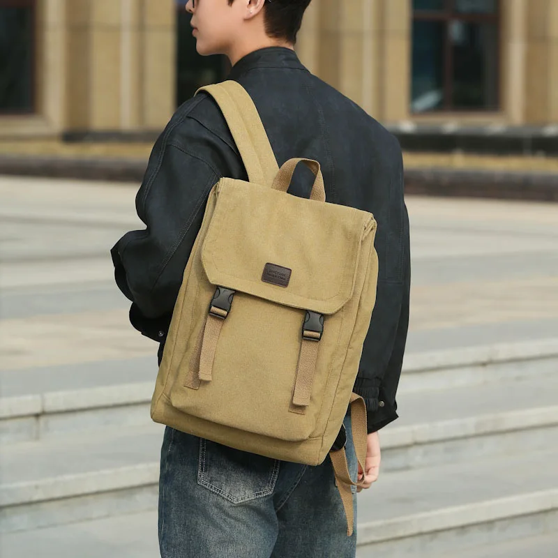 

Wear-resistant, simple, large-capacity canvas laptop backpack with flip cover and lock, waterproof student schoolbag