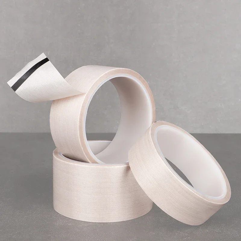 Pojedyncza tkanina powlekana PTFE Odporna na wysokie temperatury taśma klejąca Tkanina Izolacja cieplna Maszyna uszczelniająca Taśma PTFE