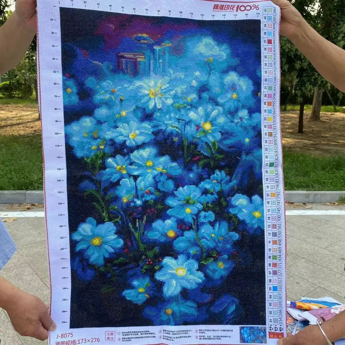 Pure handmade cross stitch finished product. Artificially embroidered picture of orchids and blue flowers. 86 * 57 full