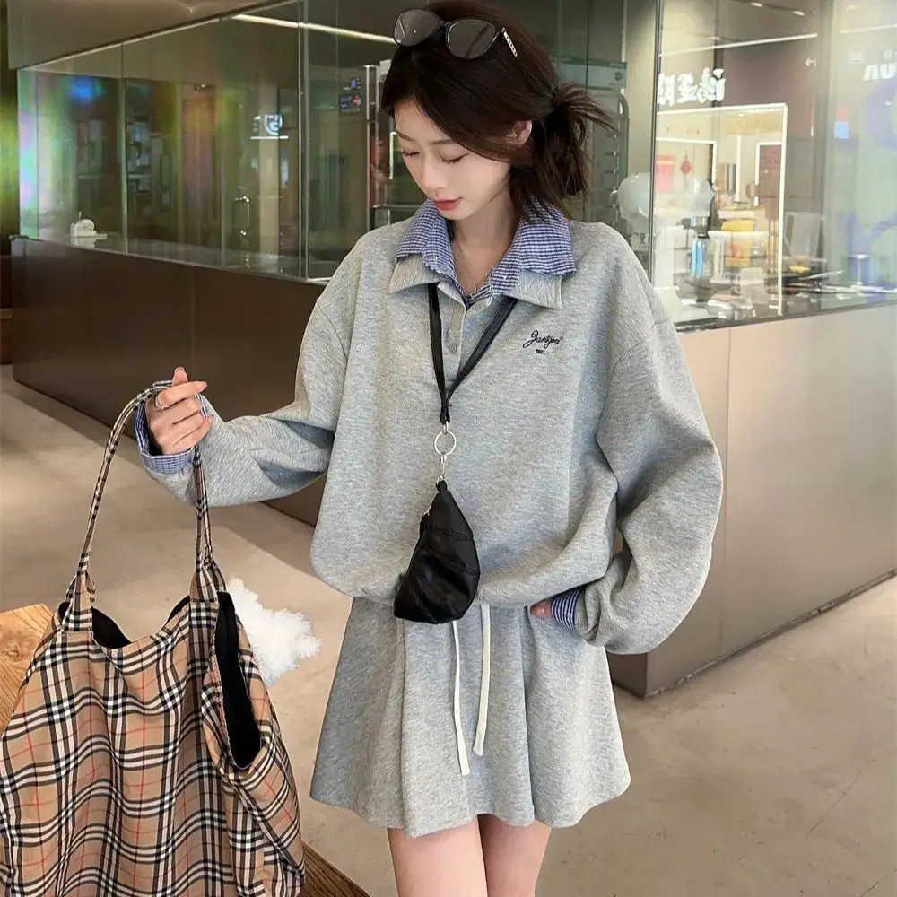 

2024 Korean fake 2pcs suit plaid lapel stitching long-sleeved sweatshirt + high waist slim A-line skirt for women