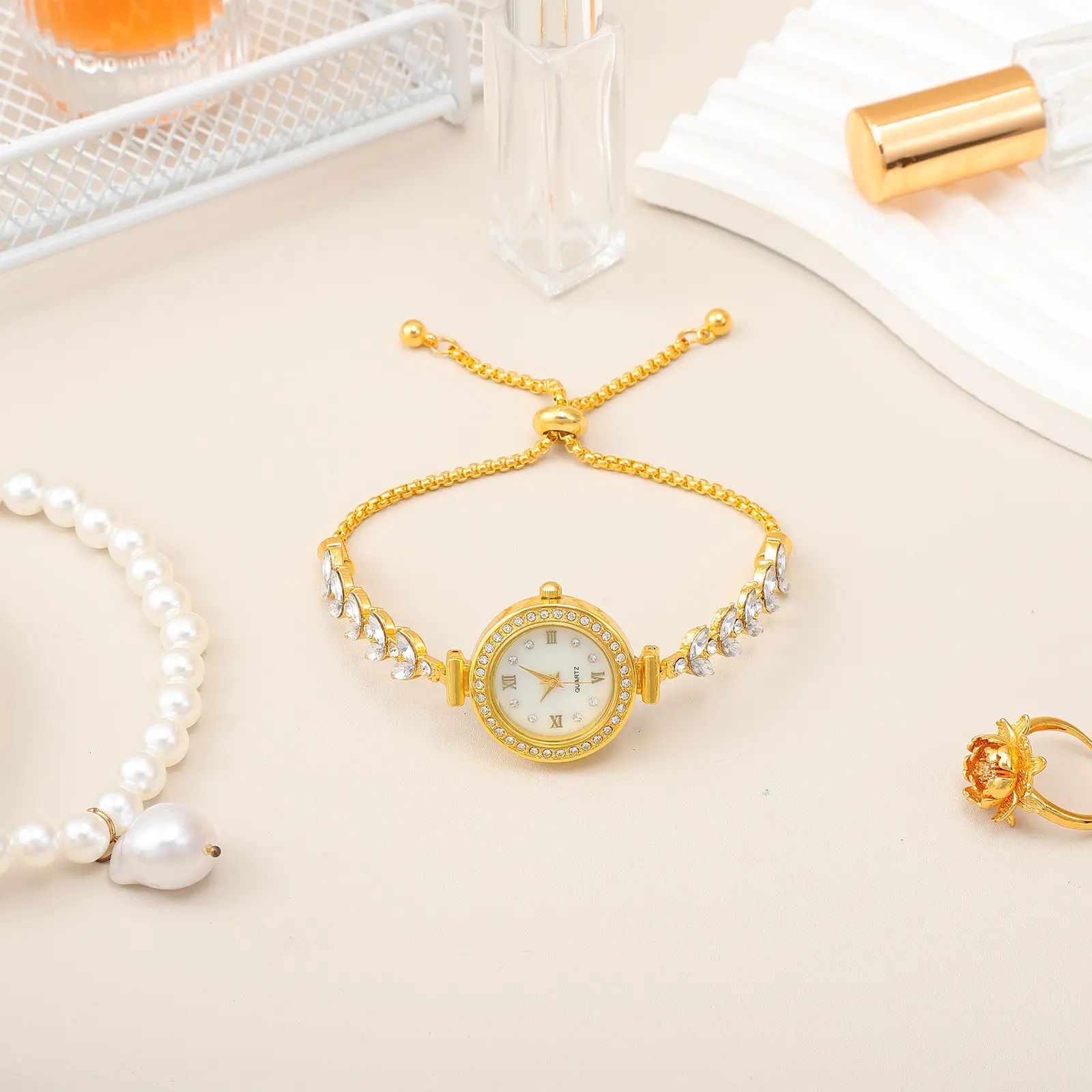 Women's Bangle Watch Rhinestone Accented Gold Alloy Analog Quartz Wristwatch Round Dial Dress Watch Comfortable Elastic Band