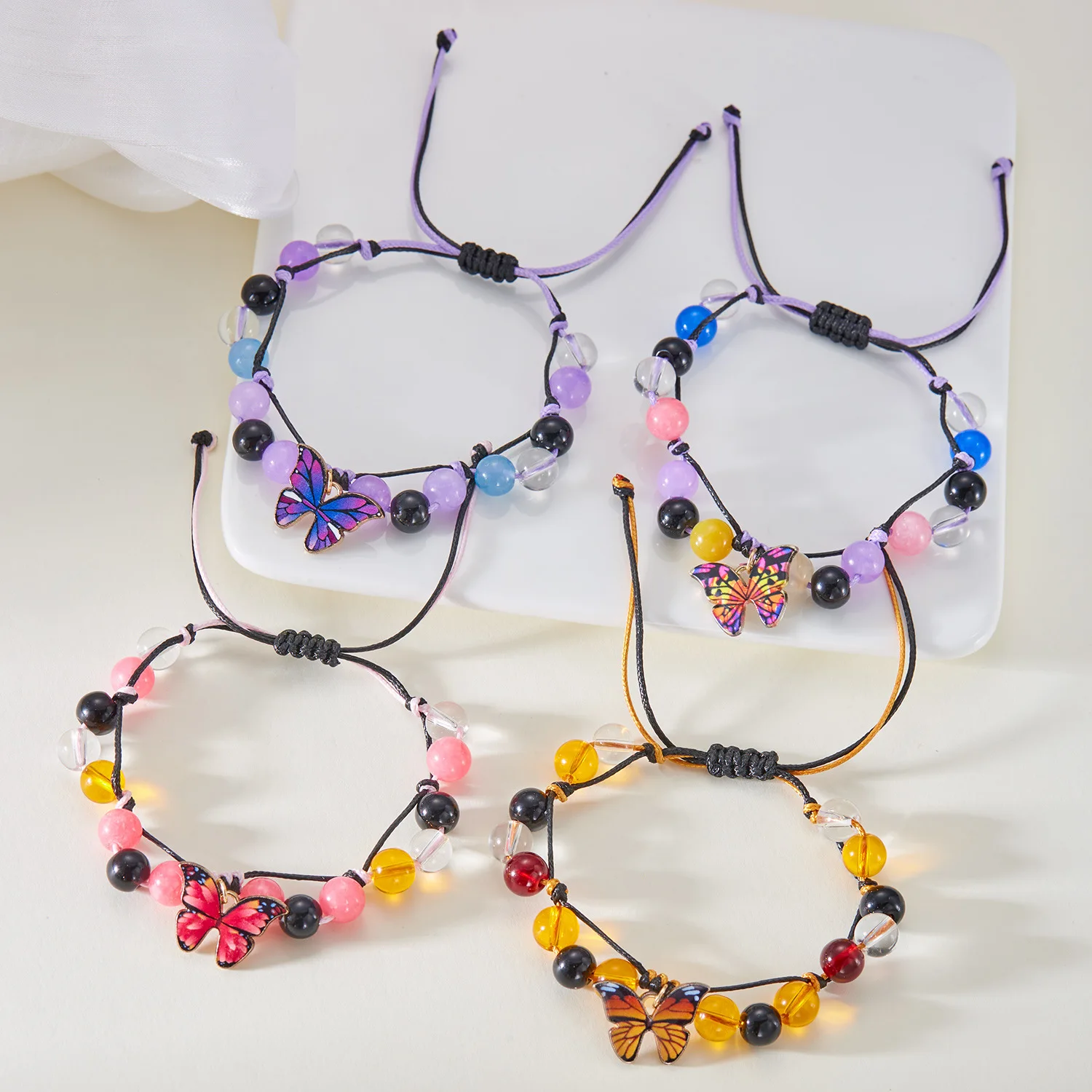 Hand woven drawstring adjustable butterfly bracelet, versatile and trendy for women