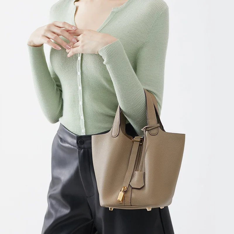 Spring new niche high-end bags 2024 new bags women\'s bucket bags handheld cabbage basket trend