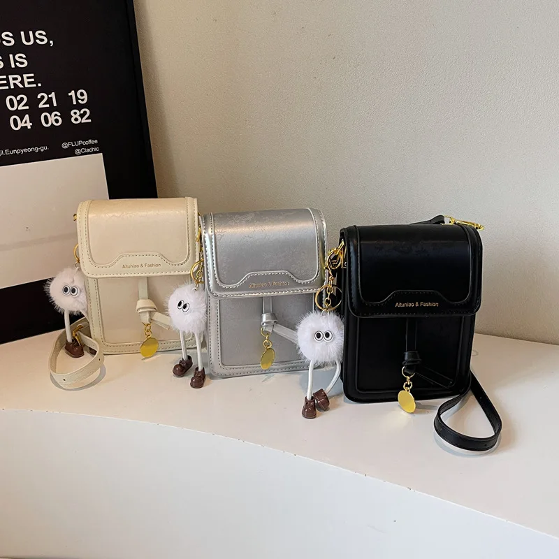 シンプルで人気の2025年韓国版新型ファッションスプライシング携帯電話バッグ、海外風メッセンジャー小型スクエアバッグ