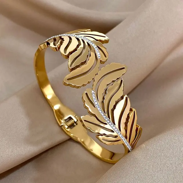 Wykwintne inkrustowane Rhinestone liście z piór bransoletki mankietowe moda pozłacana stal nierdzewna gładkie bransoletki wodoodporna biżuteria