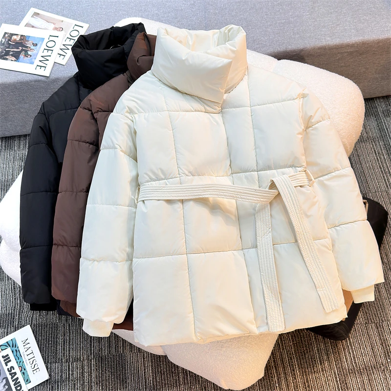 Chaqueta de plumón de invierno para mujer, chaquetas acolchadas de algodón ruso, cinturón delgado, temperamento, Parka larga gruesa y cálida, prendas de vestir holgadas y ajustadas, tendencia