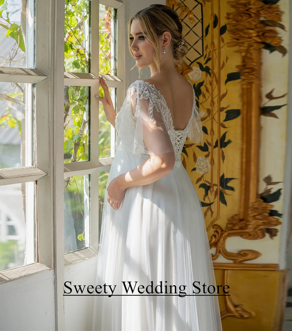 فستان زفاف العروس الحامل مخصص الخامس الرقبة مضيئة الأكمام الديكور زين تول ألف خط قطار الاجتياح مشد فستان زفاف