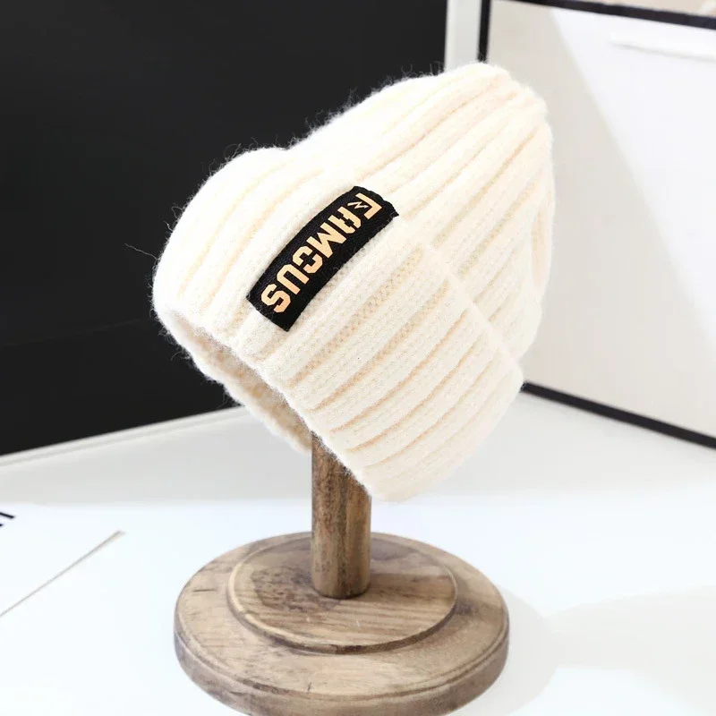 Simple letter woolen hat for men and women, fashionable and versatile knitted hat, long label, warm cycling, windproof and ear p