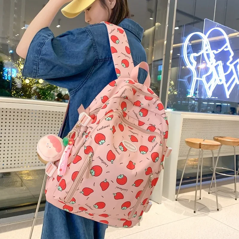 Linda mochila escolar para niñas con estampado de fresas y correa ancha para el hombro para reducir el carga y proteger el Campus de la mochila de