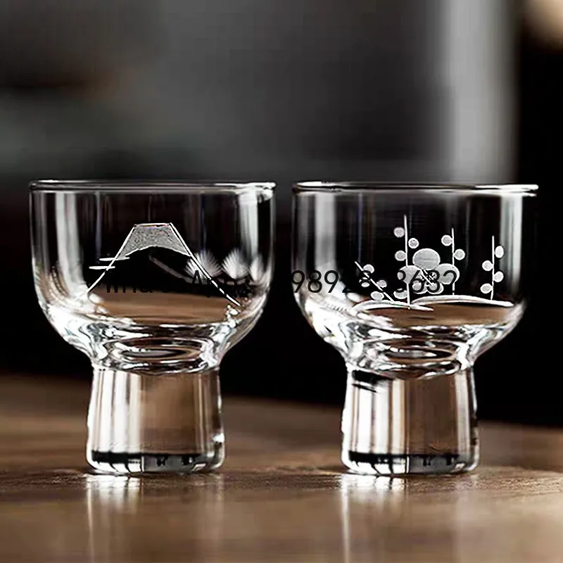 

Handcrafted glass sake cup - chiselled design with plum blossom and bamboo motif - small white wine glass