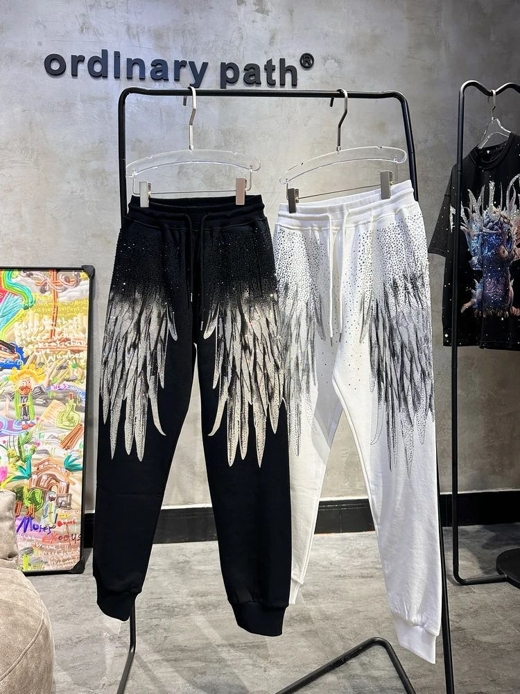 Calça de moletom feminina de luxo brilhante asas grandes, calça casual harém, streetwear bonito, calça de malha unissex, comprimento do tornozelo, perfuração a quente, perfuração a quente