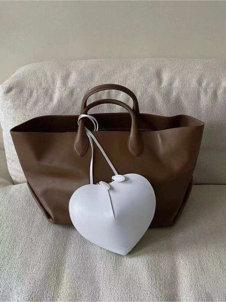 

2025 New Leisure Cowhide Basket Tote Bag Lazy Style Large Capacity Commuter Design Handbag Minimalist Premium Women Shopping Bag