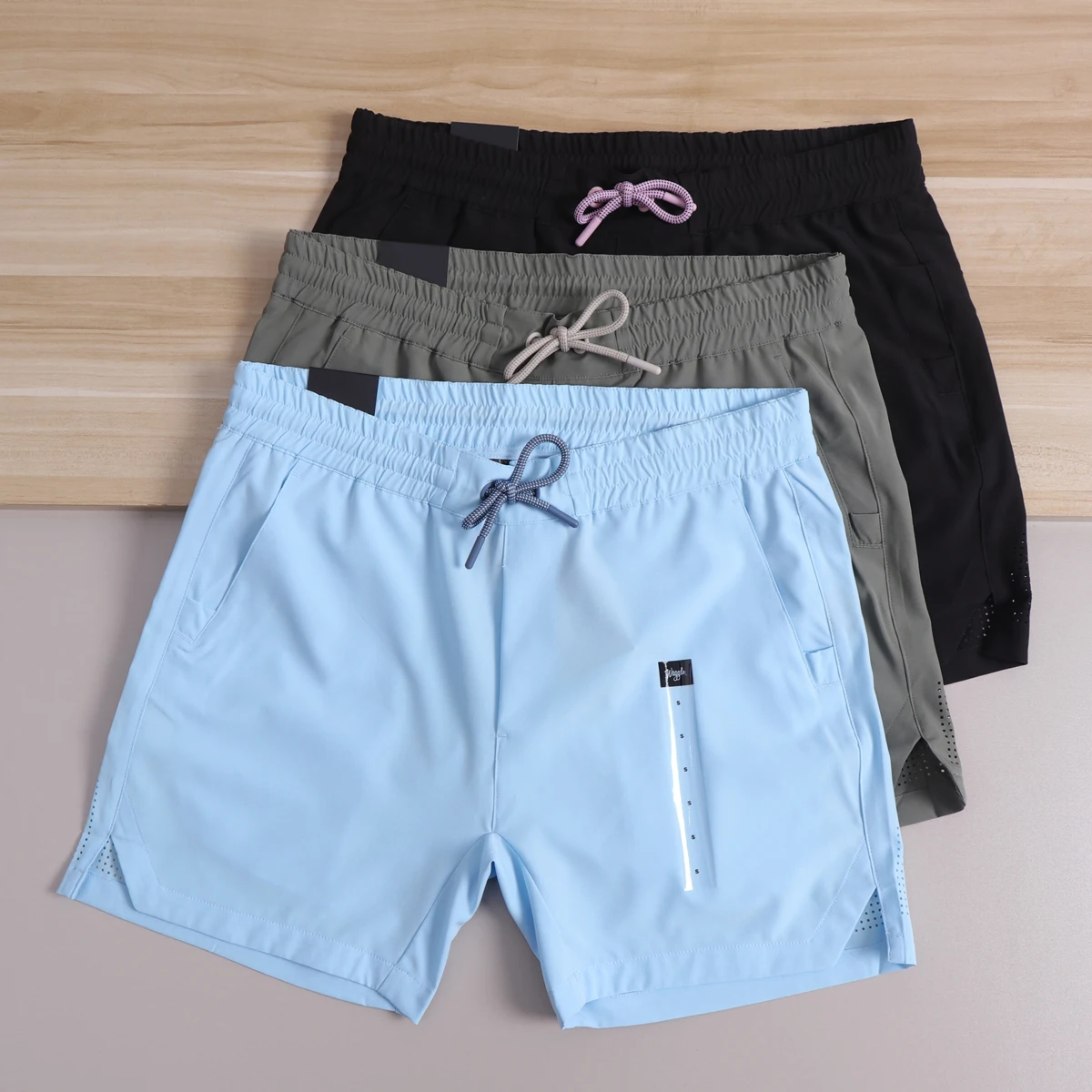 

Functional Quick Dry Laser Perforated Outdoor Sports Men's Shorts Elastic Waist Polyester Fiber Comfortable Breathable Summer...
