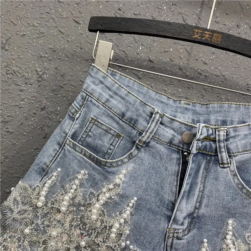 Europese goederen zware industrie genagelde kraal denim shorts dames zomer nieuwe 2025, mode hoge taille wijde pijpen broek hot pant shorts