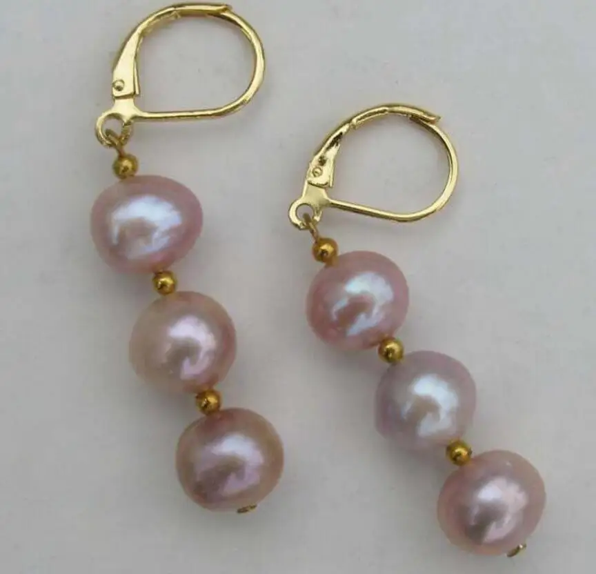 

Gorgeous A pair of natural bizarre south seas pink purple pearl earrings