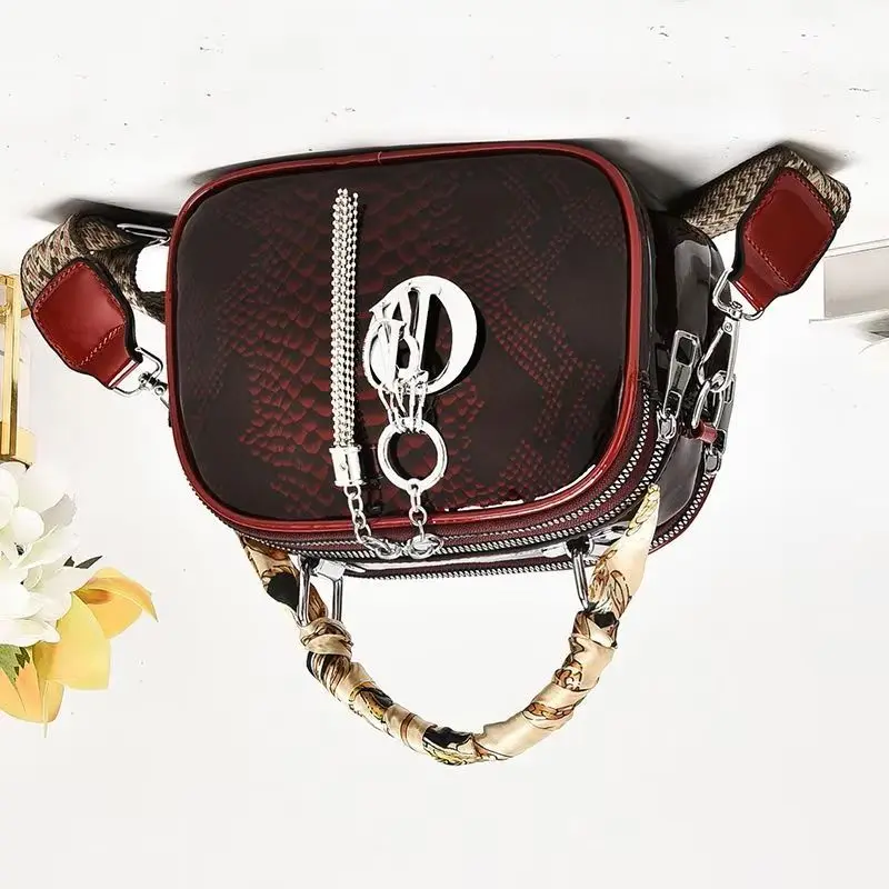 

Модная женская сумка-мессенджер 2026: маленькая круглая сумка с змеиным узором, новая высококачественная текстурированная сумка на цепочке для телефона