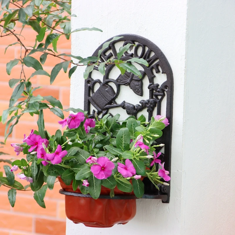 

Antique Black Cast Iron Wall Flower Pot Rack With Welcome Signs Butterfly Sunflower Watering Can Decor Garden Planter Holder