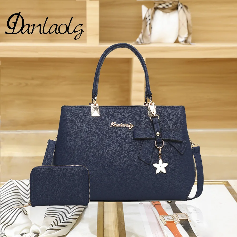 The Classic Elegant new style handbag simple Korean version of women's handbag shoulder bag messenger bag bag bag mother bag