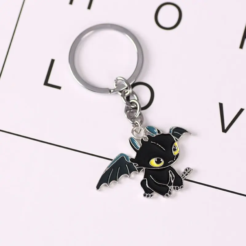 New How to Train Your Dragon Toothless Light Fury keychain with high-value cool figurine design creative couple backpack pendant view 3