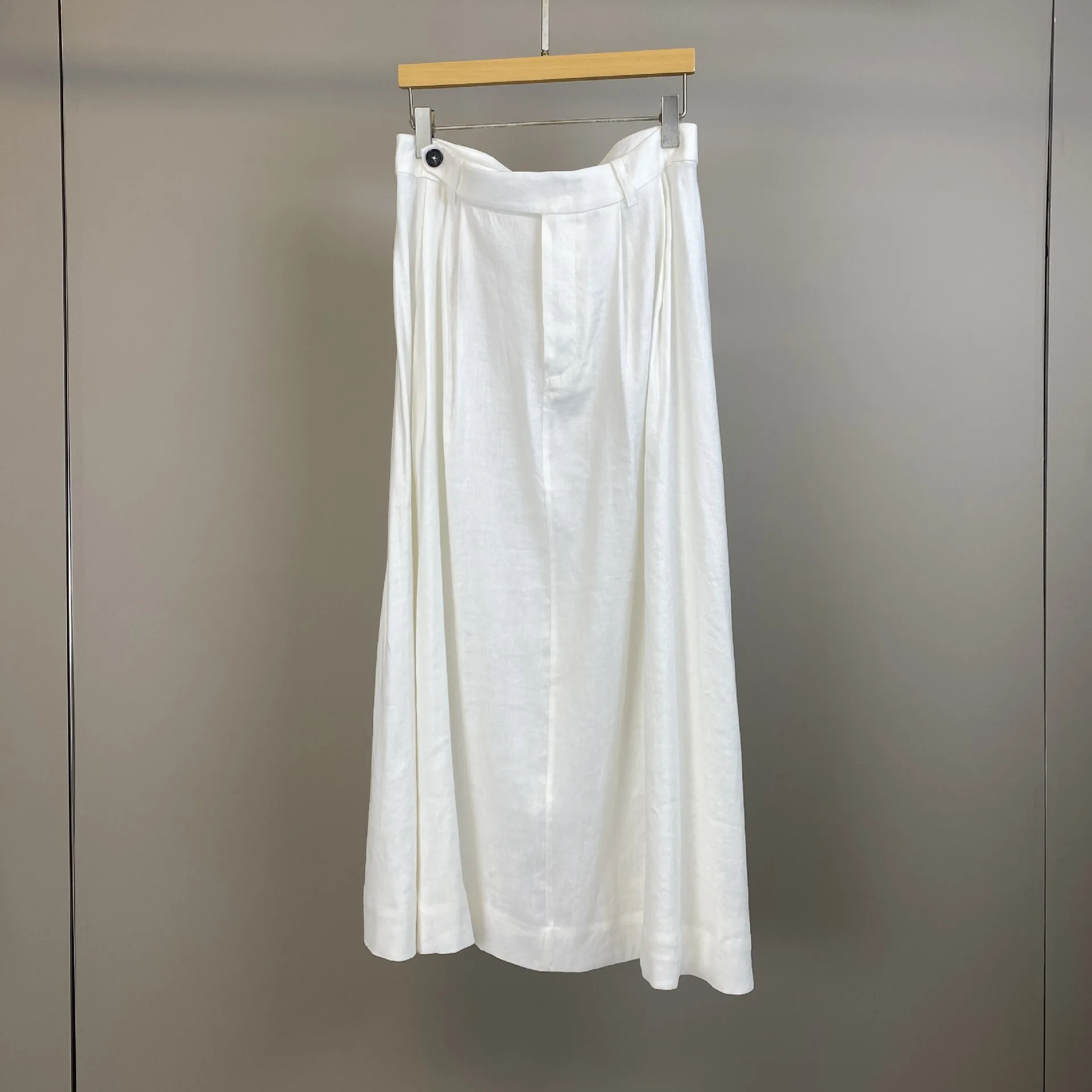 

2026 Spring/Summer New Linen Solid Color Single Button Mid-Length A-Line Skirt For Fashionable Commuter Women