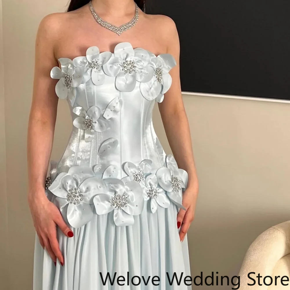 Customized Romantic Evening Gown Featuring a Strapless Neckline, Structured Corset Bodice with 3D Floral Appliqués