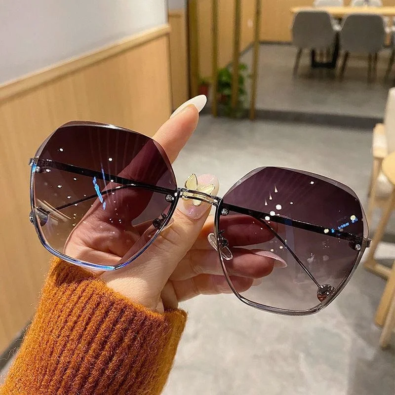 

2024 new cut edge sunglasses frameless Tiktok live broadcast with goods big frame Korean version Chaojie snap ins gradually