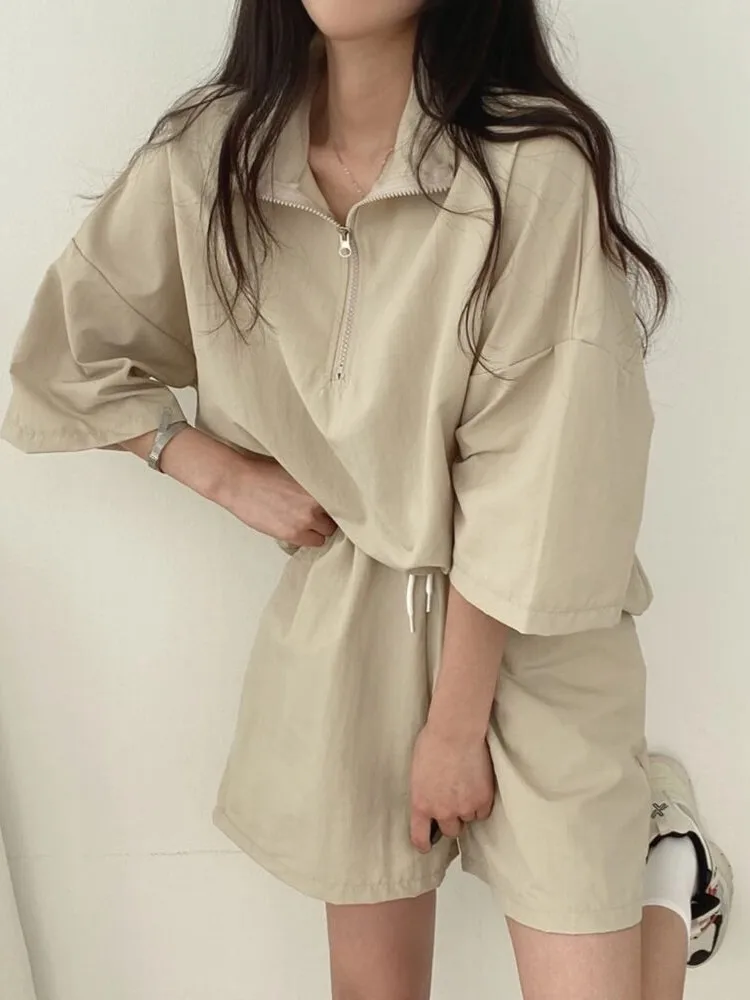 Conjunto de ropa deportiva informal a la moda, conjunto de dos piezas de plones cortos de pierna ancha con capucha y crem...