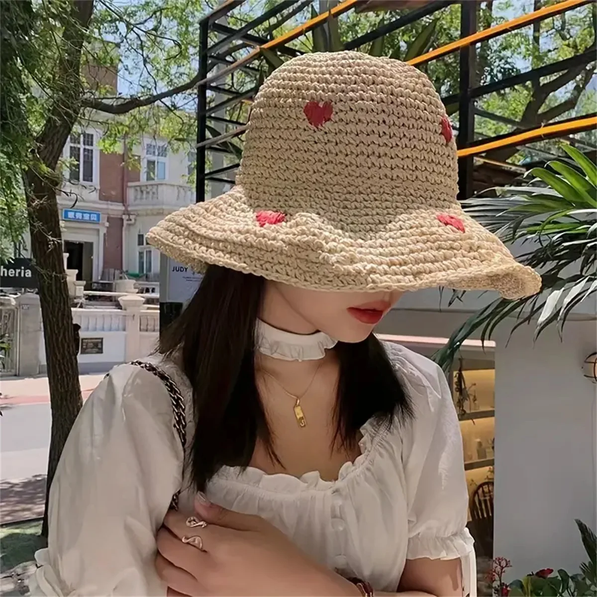 An Insta-style wavy edge large eaves straw fisherman hat women\'s summer braided love straw hat holiday beach breathable sunshade