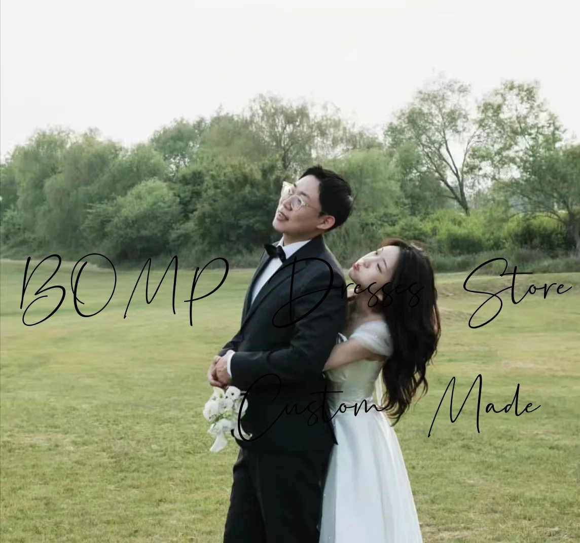 فستان BOMP أنيق لحفلات الزفاف على شكل قلب وأكمام قصيرة ثنيات بطول الأرض كوريا لالتقاط الصور فستان استقبال الزفاف حسب الطلب