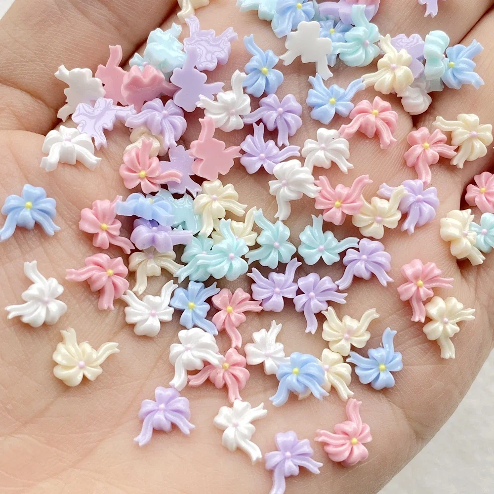 100 ชิ้นผสมสีสันโบว์ริบบิ้นเล็บแบน Rhinestone ลูกปัดสมุดภาพ DIY เล็บ Appliques อุปกรณ์เสริมหัตถกรรม