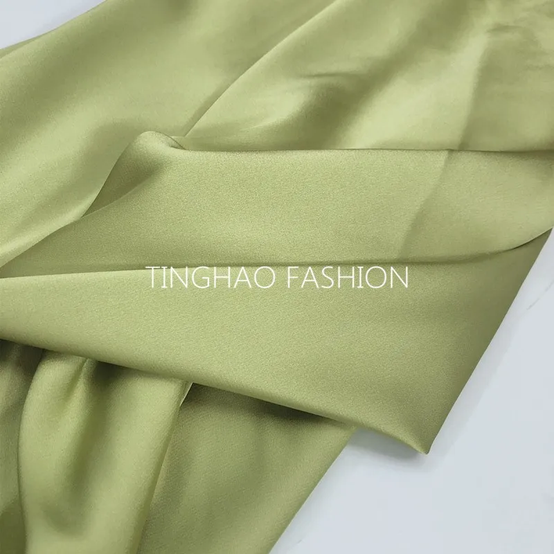 Avocado green satin silk shirt fabric drape dress women's professional fashion background