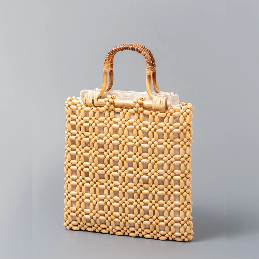 

Large capacity bamboo female handbag solid color hollowed-out hand-woven totes bag female beach holiday wooden bead clutch purse