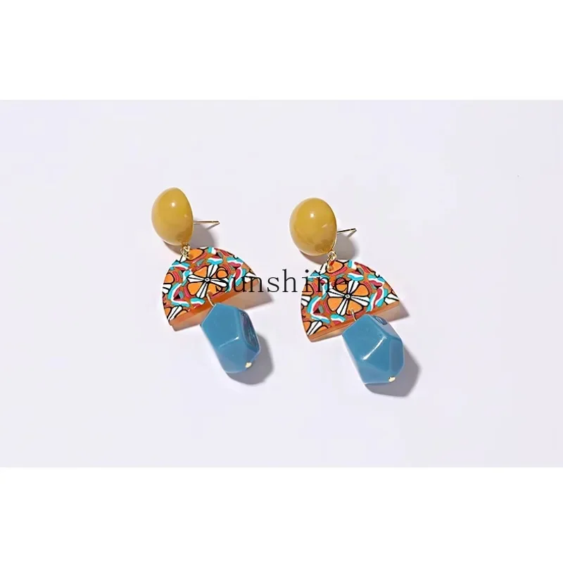 

Retro ethnic style yellow and blue contrasting color earrings temperament exaggerated niche design resin stud earrings