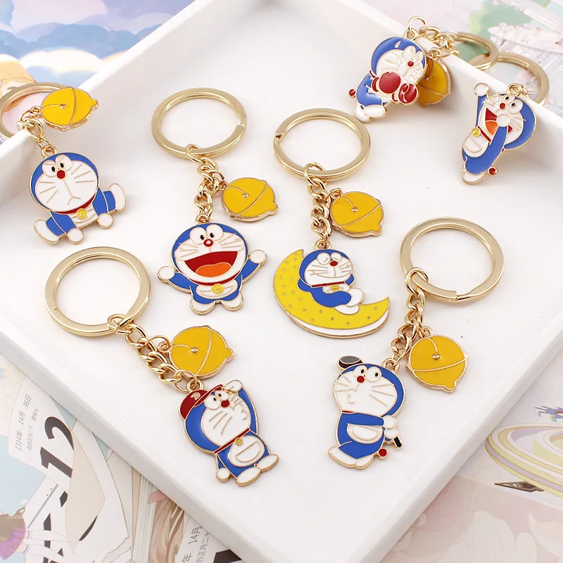 Anime giapponesi Doraemons Kawaii cartone animato portachiavi con motivi anime merchandise zaino fascino piccolo regalo